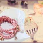 pink braided bracelet